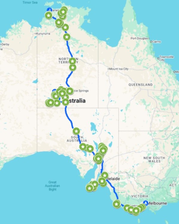 Map of Australia marked with a blue route line and green location pins tracing the full Melbourne to Darwin road trip, highlighting key stops across Victoria, South Australia, and the Northern Territory.
