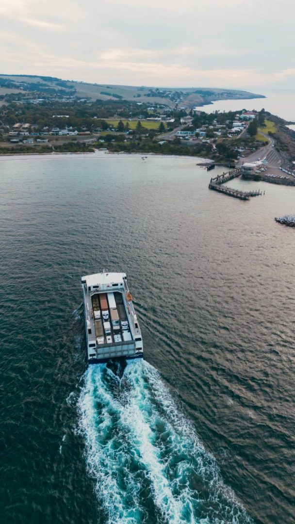 Drone shot of the Kangaroo Island ferry departing mainland South Australia, an essential part of any kangaroo island 3 day itinerary.