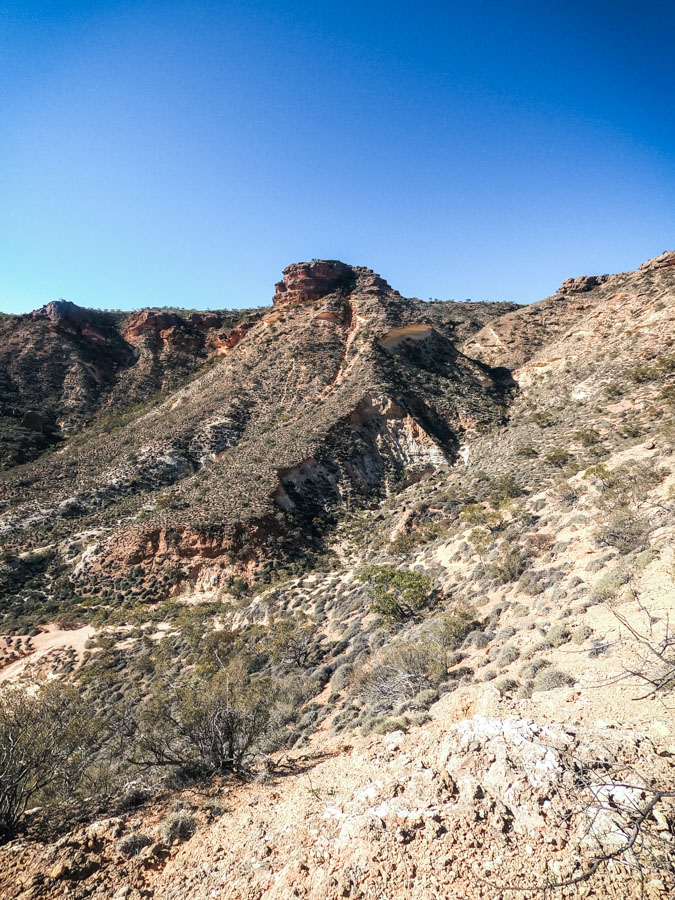 Hiking trail through the striking Shot Hole Canyon, highlighting the red cliffs and gorges in Exmouth, WA.