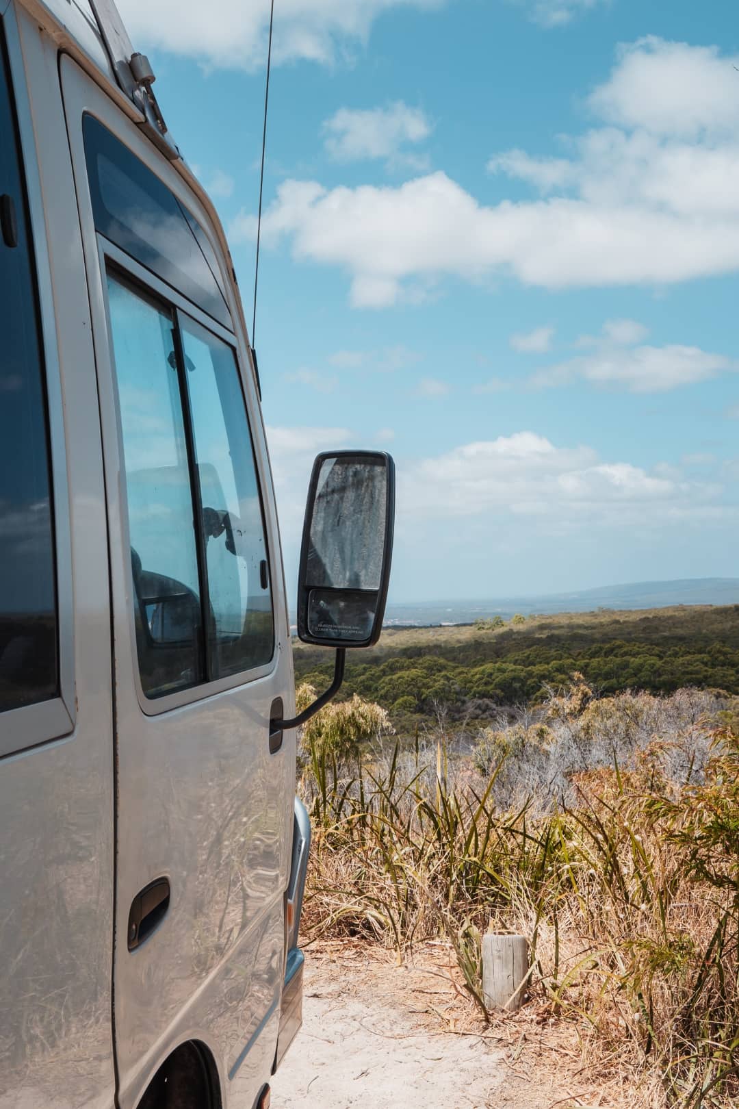 A camper van travelling to Margaret River, Western Australia in a sunny day