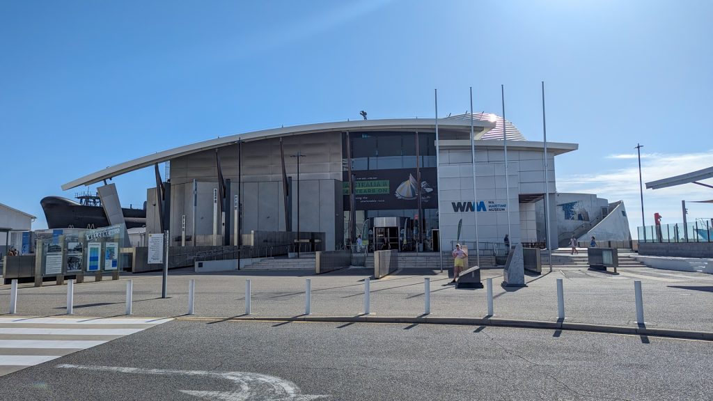 Exterior view of the Fremantle Maritime Museum in Western Australia, featuring a modern building with a submarine displayed to the side. A must-add to a Perth itinerary