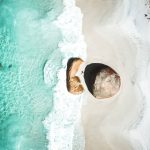 Aerial view of the turquoise waves crashing at Greens Pool, a white sandy beach in Western Australia, a stunning coastal stop along a Perth to Albany road trip.